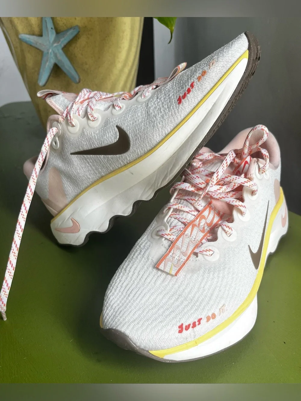 Nike Women’s White Sneakers with Pink Lining and Yellow Trim